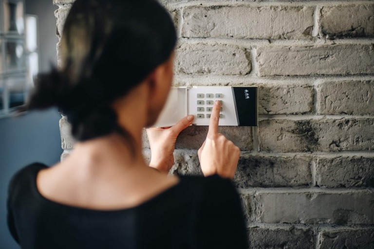 woman at security keypad